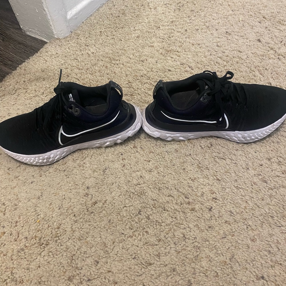 Black and white Nike running shoes